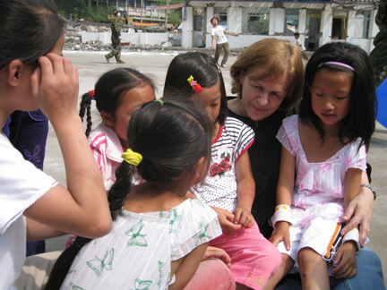 At a tent school, children struggle to resume a normal routine