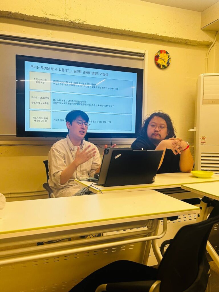 Activists giving a presentation at an event