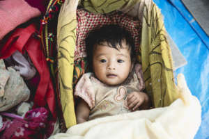 A baby girl in our Alchi Danda shelter.