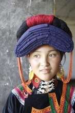 Young woman in traditional Yi costume
