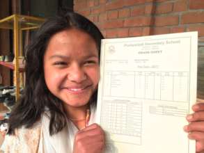 Rekha with her Perfect Report Card!