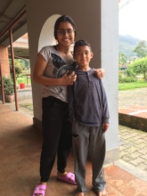 A young Akshar with Ama Ghar alum Jenuka