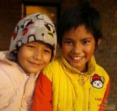 Pooja (left) and her new sister Alysha