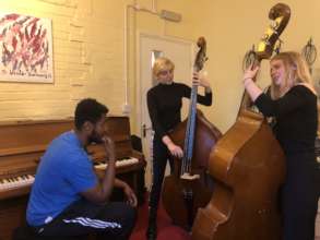 Bass players at World Heart Beat