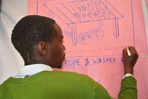 Instructing farmers at the Agricultural Expo