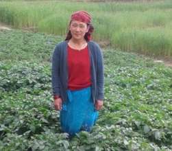 Lalika in her own vegetable field