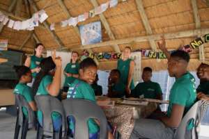 Children and Volunteers in Classroom