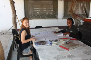 Erica and Patience updating the teaching program