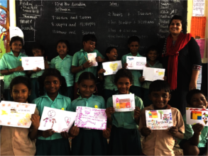 Students posing with their drawing art