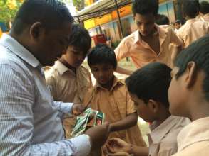 Arun working with his students