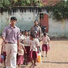Fellow in North Chennai leading his students