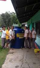 Teachers  at Catig-Lacadon with new water tank