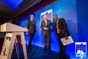 Hilonga receiving the award from Prince Andrew, UK