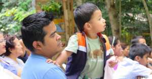 Rapt young audience member at his first play