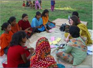 Sarah and girls discussing what they had learned