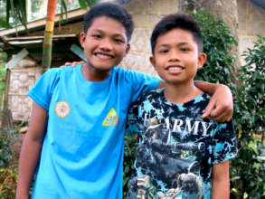 Vilmar (left) poses with his brother