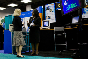 Robin Avant talking to a Pediatric Oncology nurse