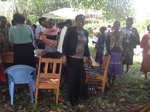 Grace working with Grace Wamue with India women