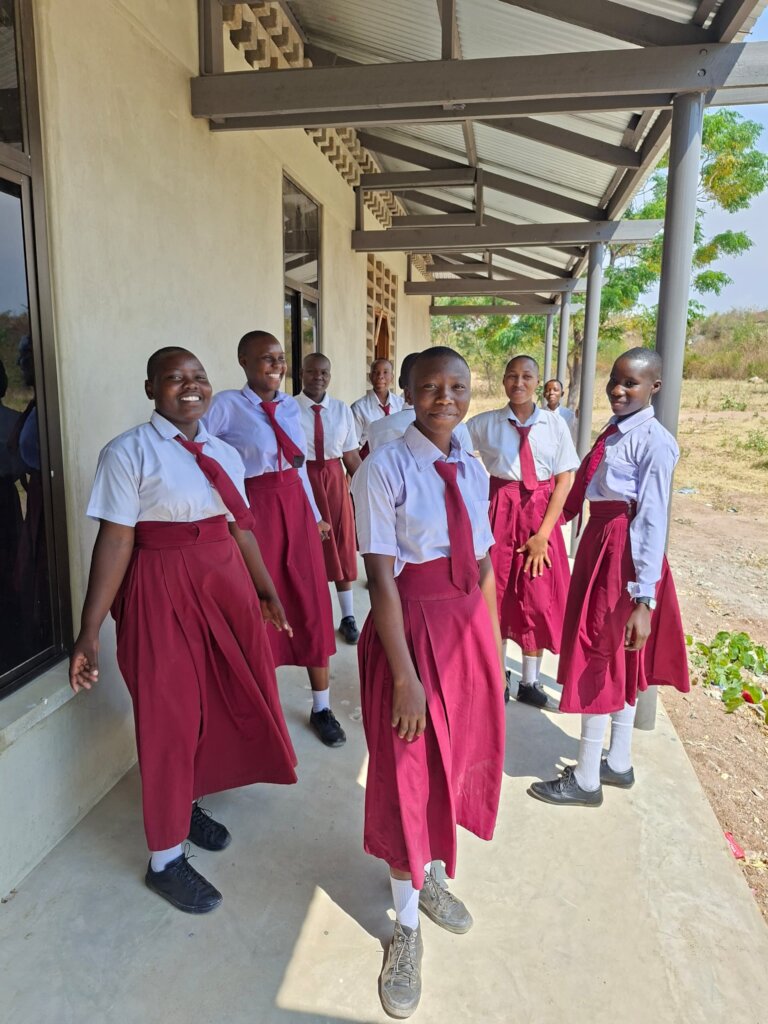 Girls touring their new dormitory