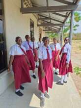 Girls touring their new dormitory