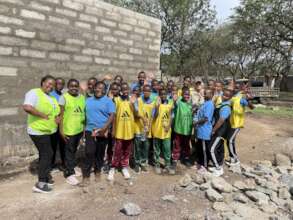 TGFT Director + girls visiting the construction.