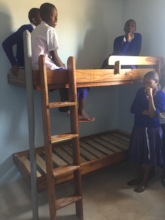 Girls trying out the upper bunk!