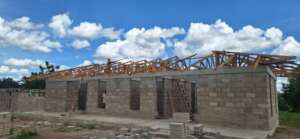 Girls' dormitory with roofing trusses started!