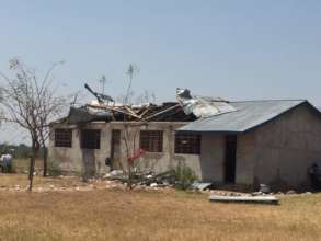 Damaged classroom roofs at Milembe School