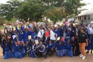 Milembe students with books donated by TGFT.
