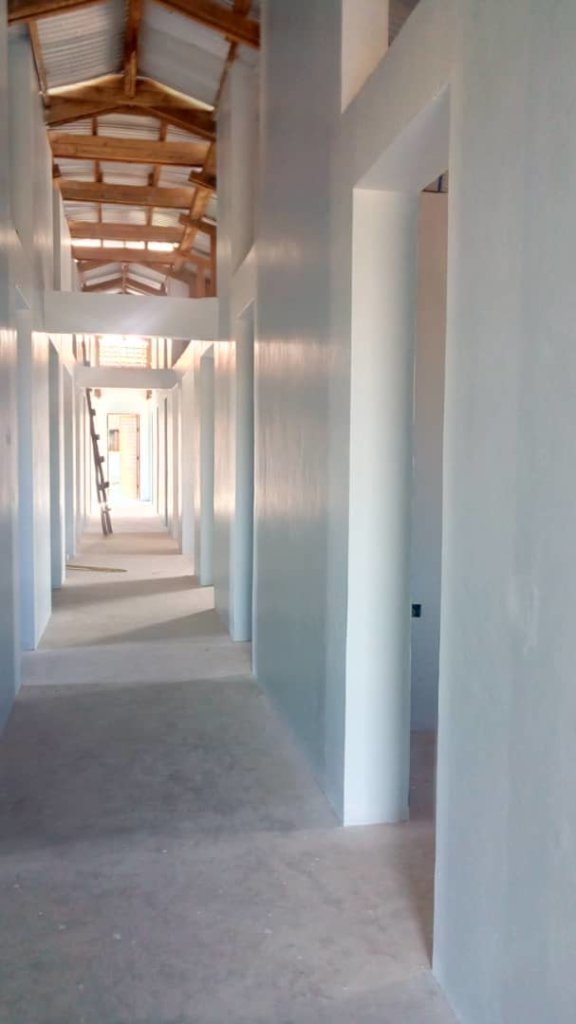 Dorm interior with light from roof monitors.