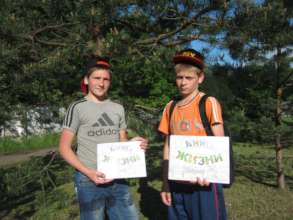 Artem and his friend with Books of life