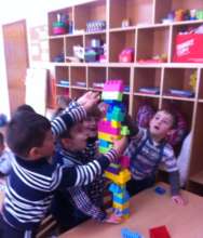 Boys build a tower