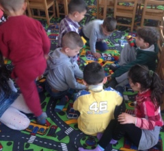 Children engaged in floor time play