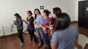 Participants partake in community education game.