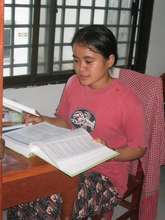 Sarem at her desk in girls' dorm