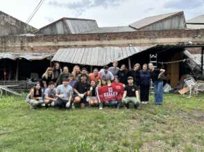 Volunteers cleaning the shed at San Jose Home