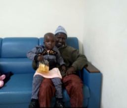 Yunusa and his dad waiting for surgery