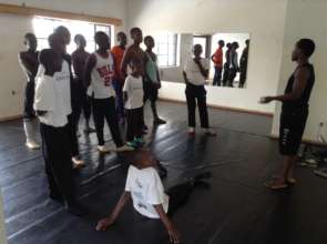 Eugene speaking with students after class