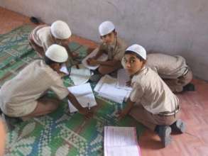 Rizwan studying independently