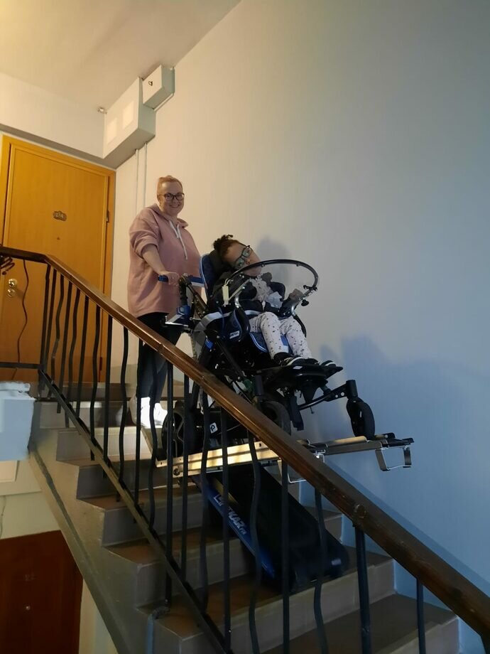 Michel and his stroller-step walker