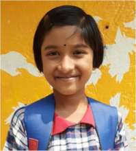 Poushali* in a joyful smile