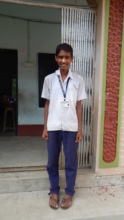 Sujon - rescued child studying in Model School
