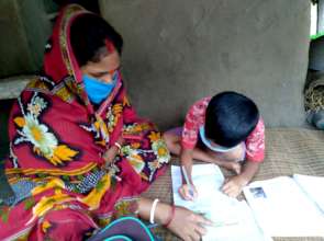 Sankar* in studies .... with his Mother