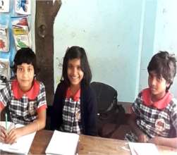 Prerona* (in the middle) with her class-mates