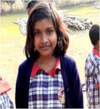 Prerona* in her shy but bright smile