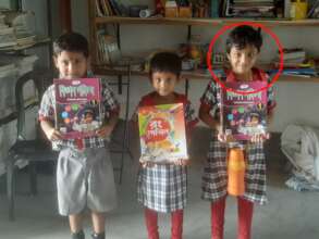 With books received from School for New Class