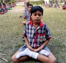 In meditation  with other mates