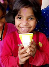 Happy child with a pack of juice