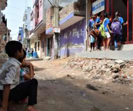Children on road needs to be back in school