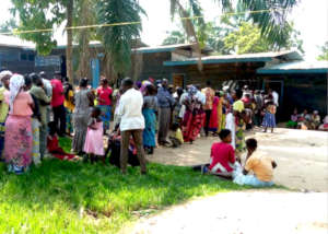 Displaced families wait for cash handouts